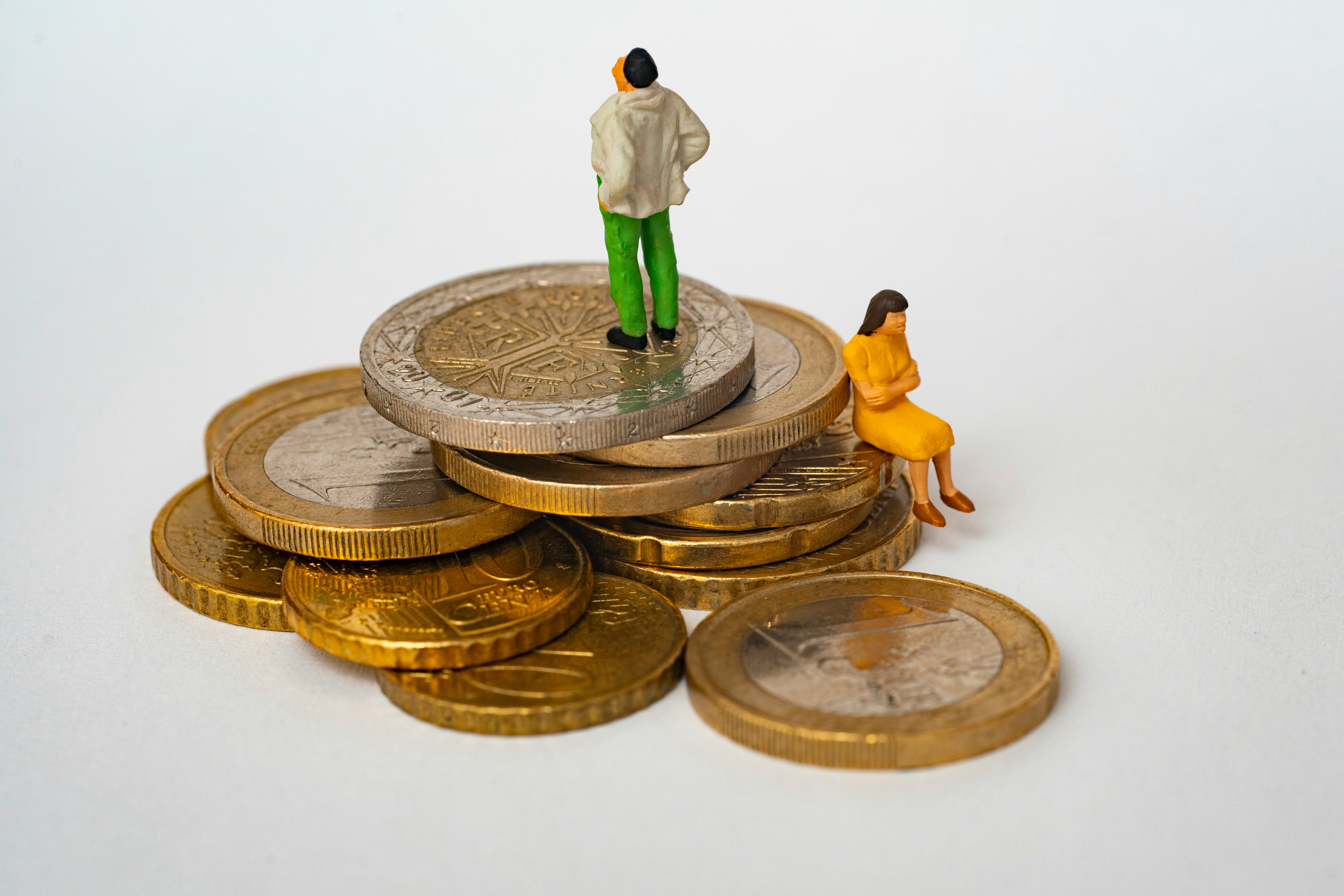 Person on stacked coins